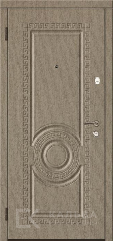 Фото №2 «Железная дверь бетон с рейками и панелью медальон для квартиры №388»